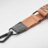 Mobile phone holder with woven tape cross and PU patch (Production)